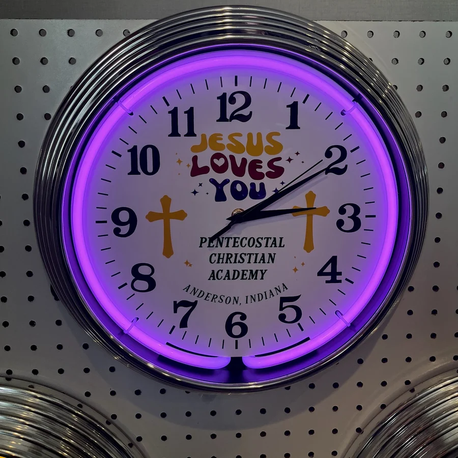 Jesus Loves You, Jesus Loves You: Pentecostal Christian Academy neon clock